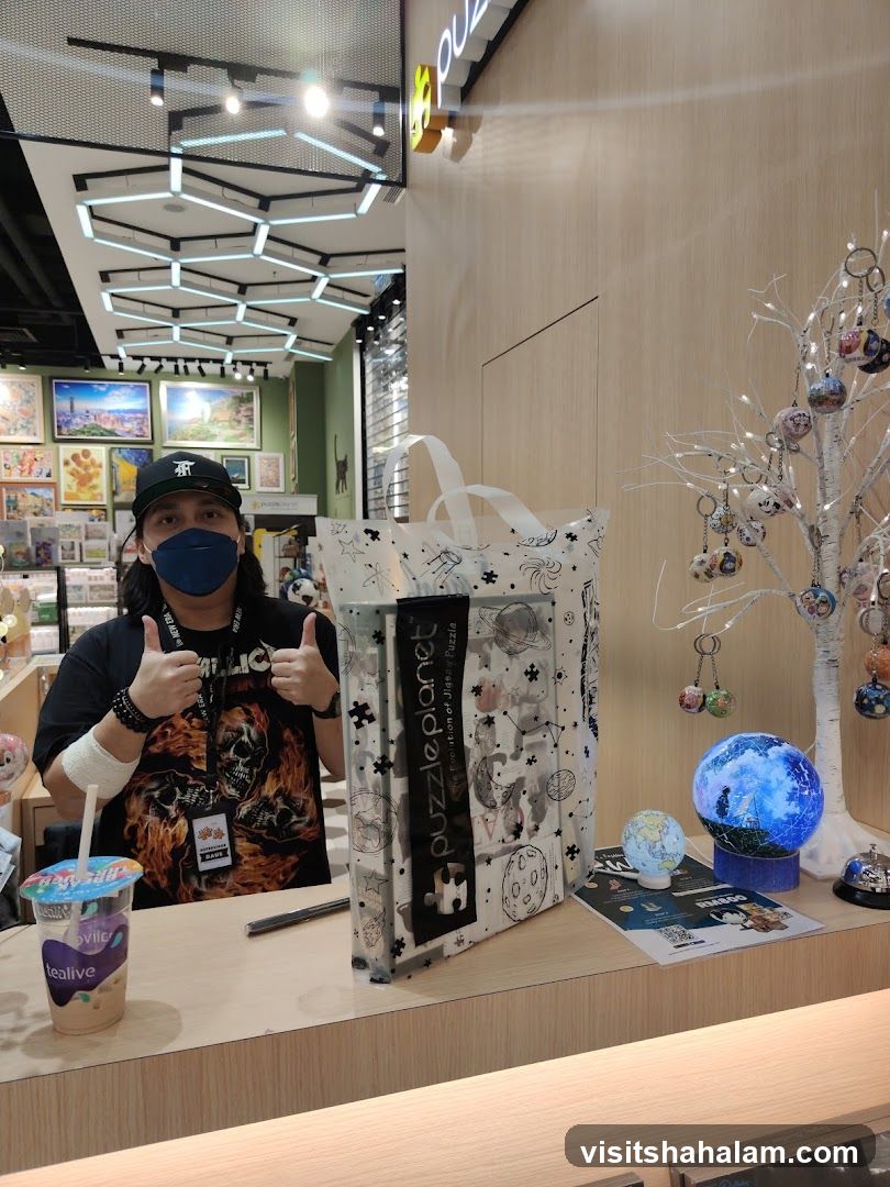 Person with Puzzle Planet Bag