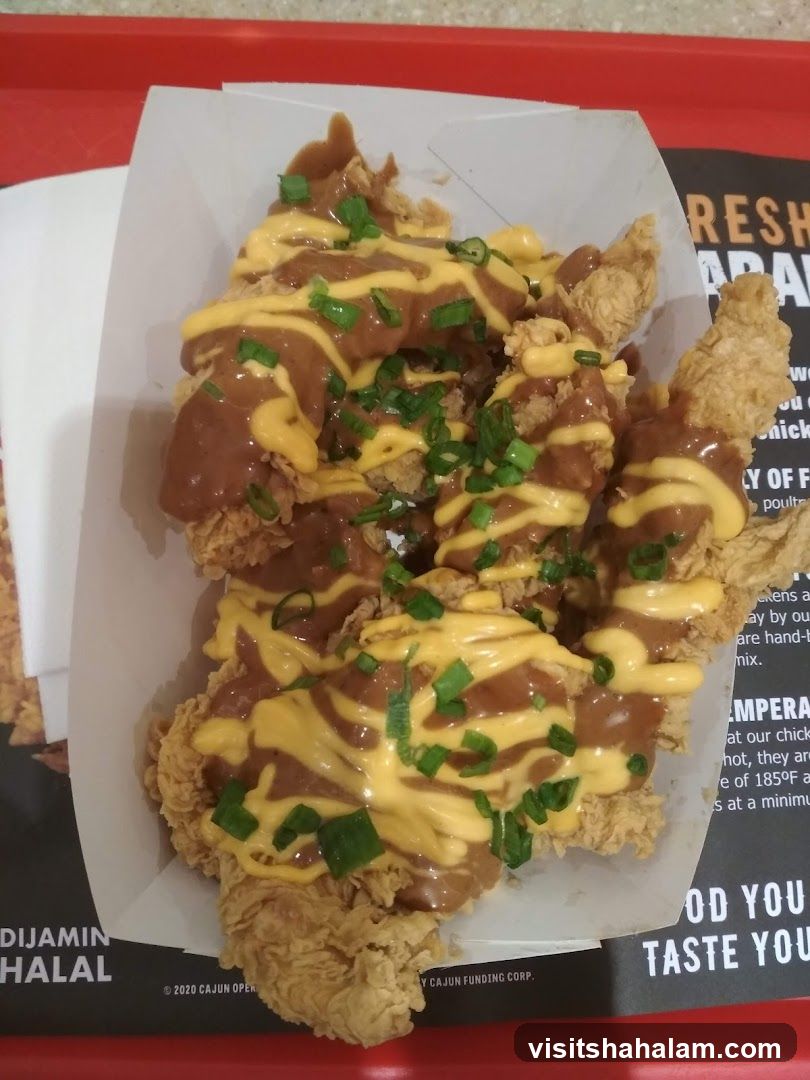 Fried Chicken with Gravy and Cheese Sauce