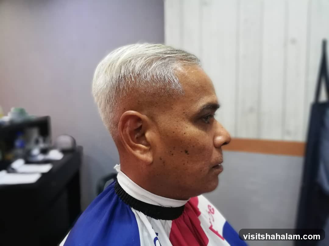 Man in Barber Cape
