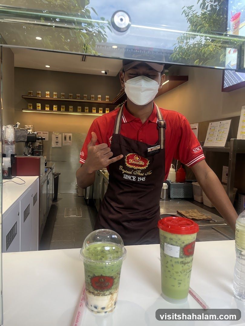 Barista serving drinks
