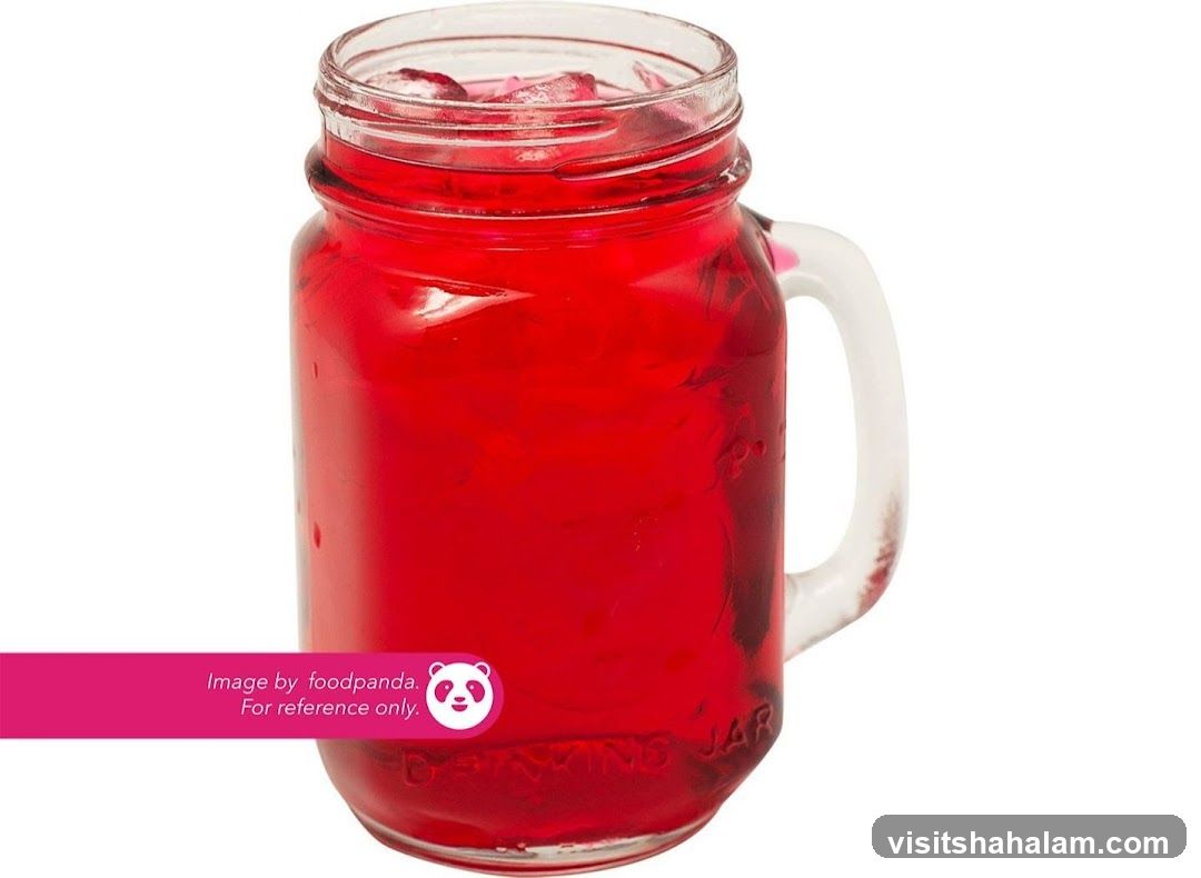Red Drink in a Mason Jar
