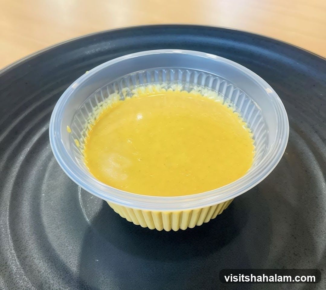 Yellow Sauce in Container