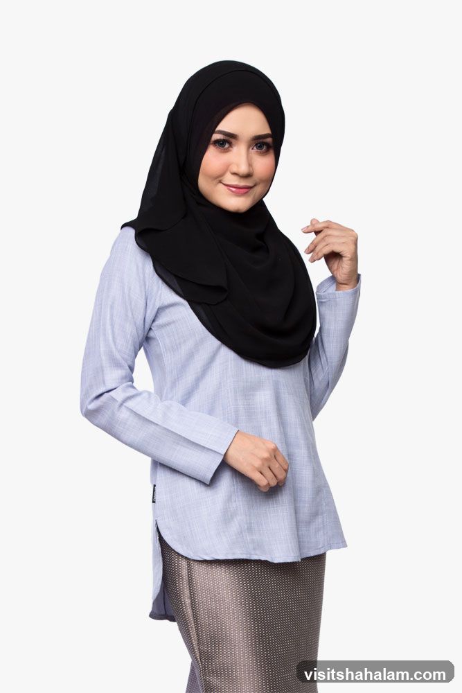 Woman in Hijab and Blue Blouse