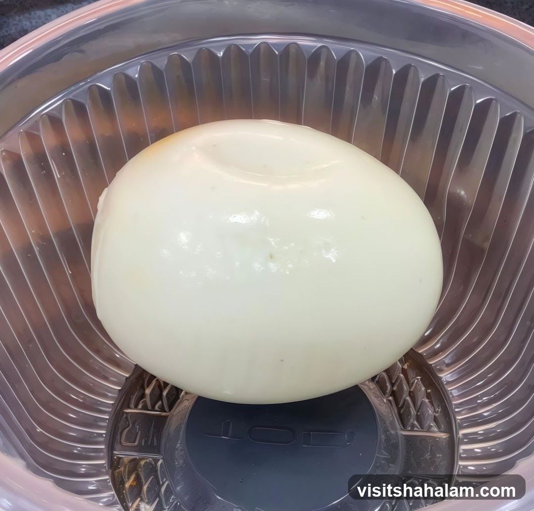 Peeled Onion in Container