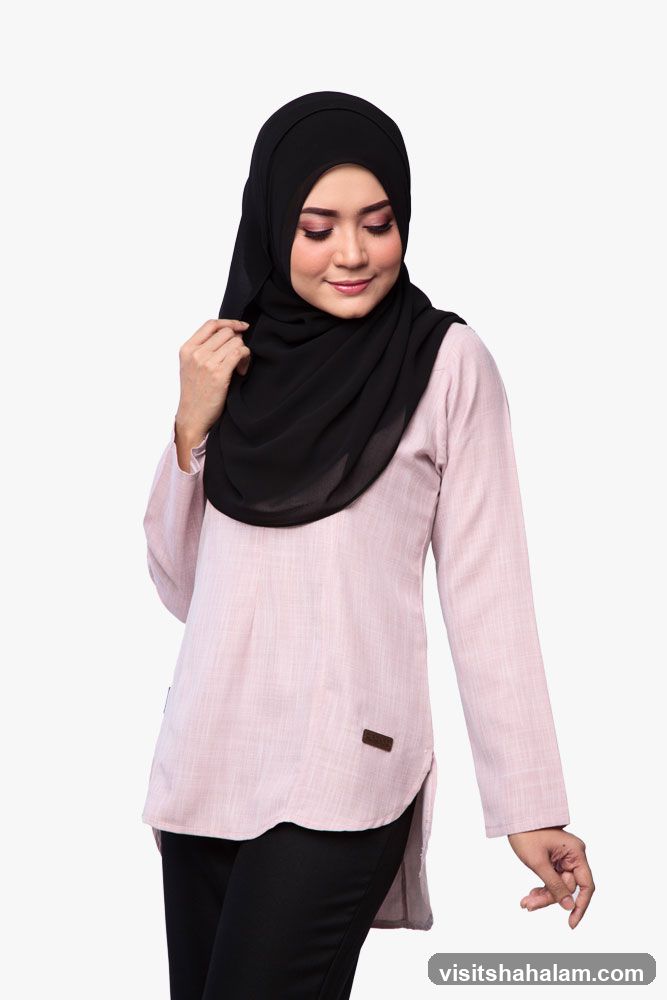 Woman in Hijab and Pink Tunic