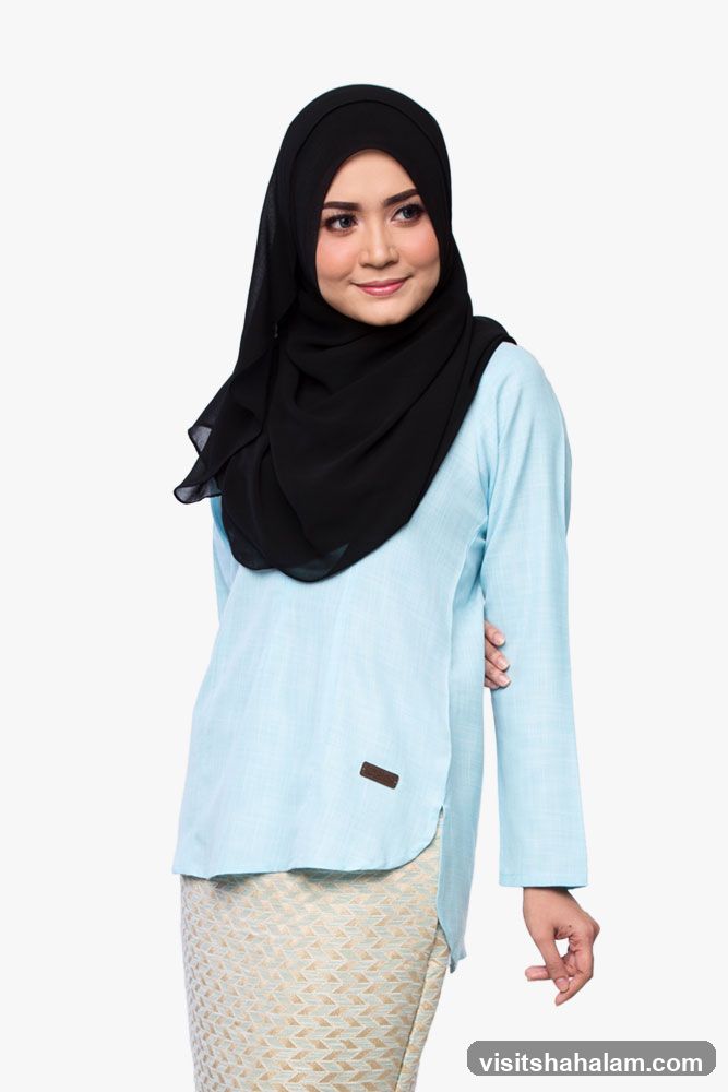 Woman in Hijab and Traditional Attire