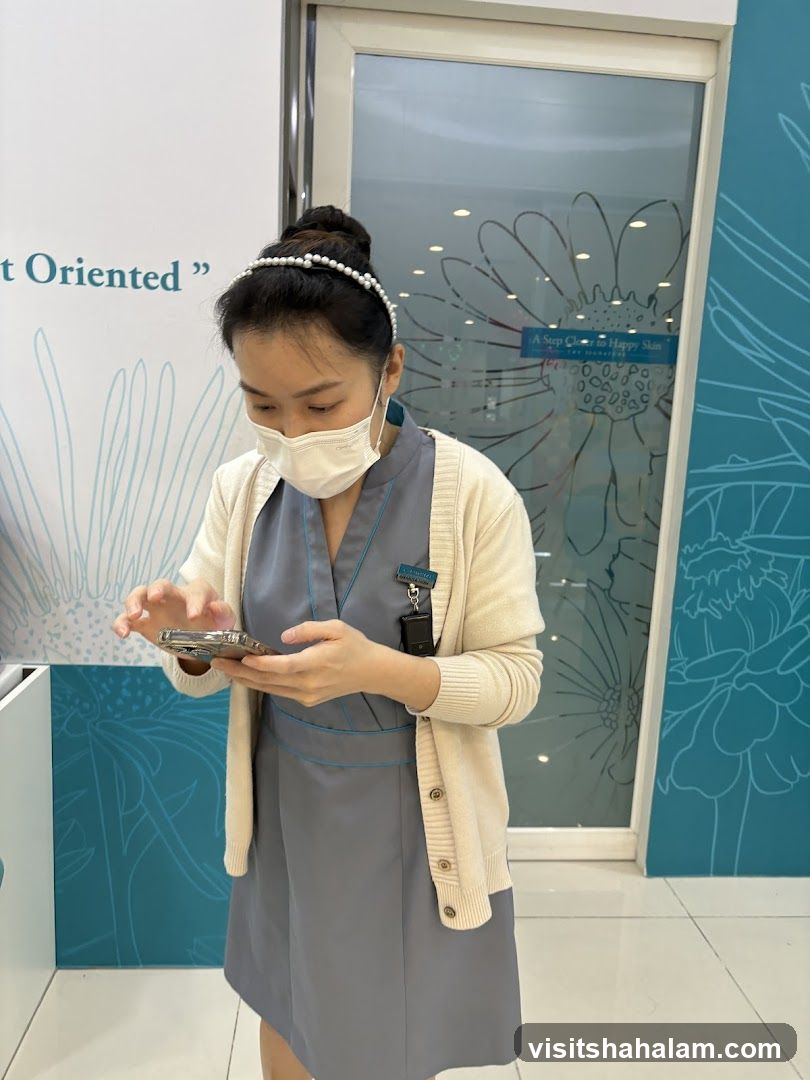 Woman in uniform using phone
