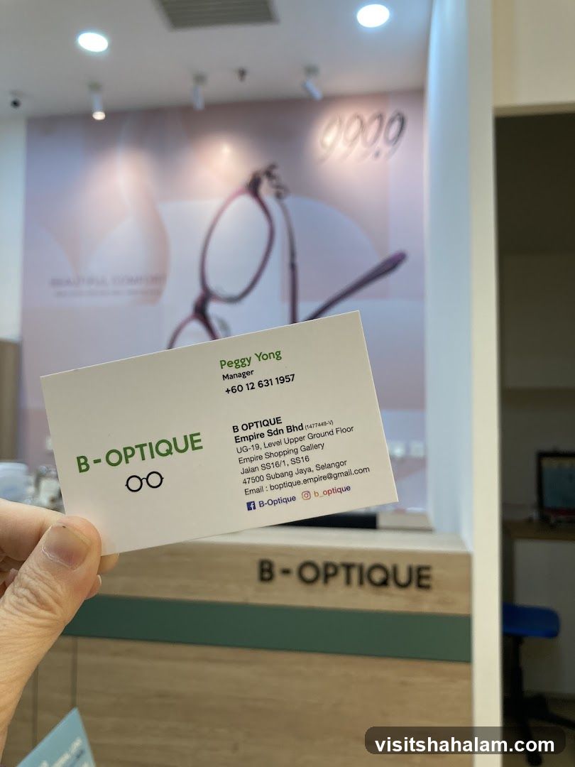Business card in front of an optical shop counter