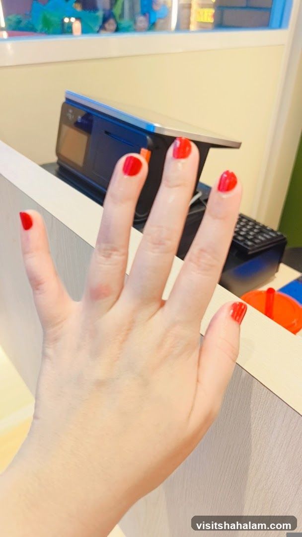 Hand with Red Nail Polish