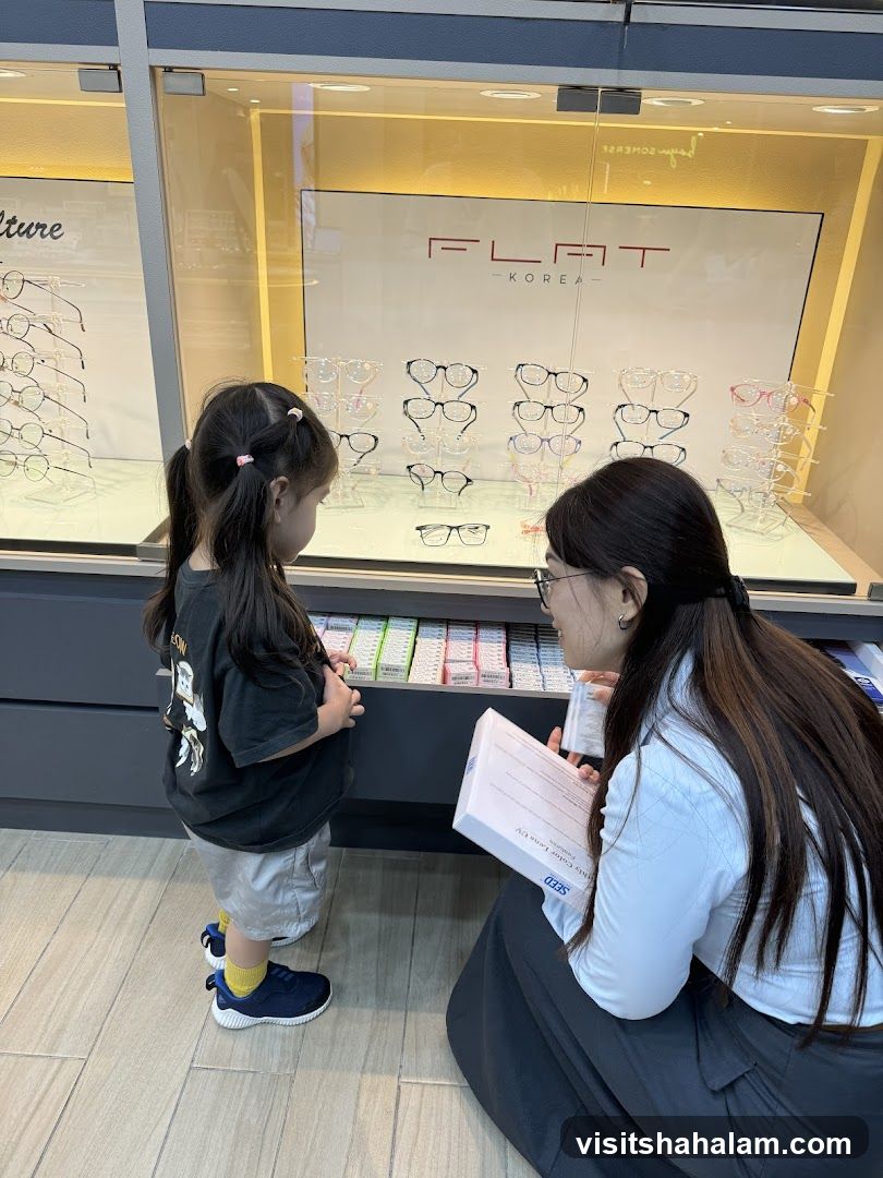 Optician assisting a child