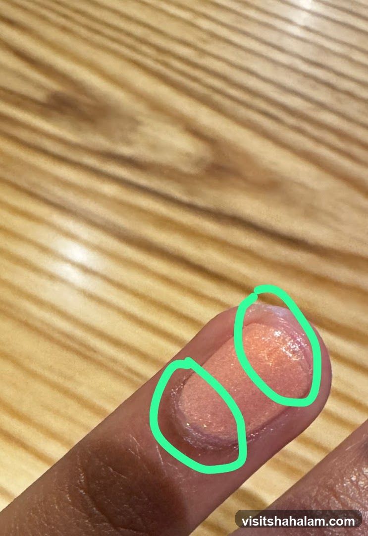Close-up of a finger with makeup