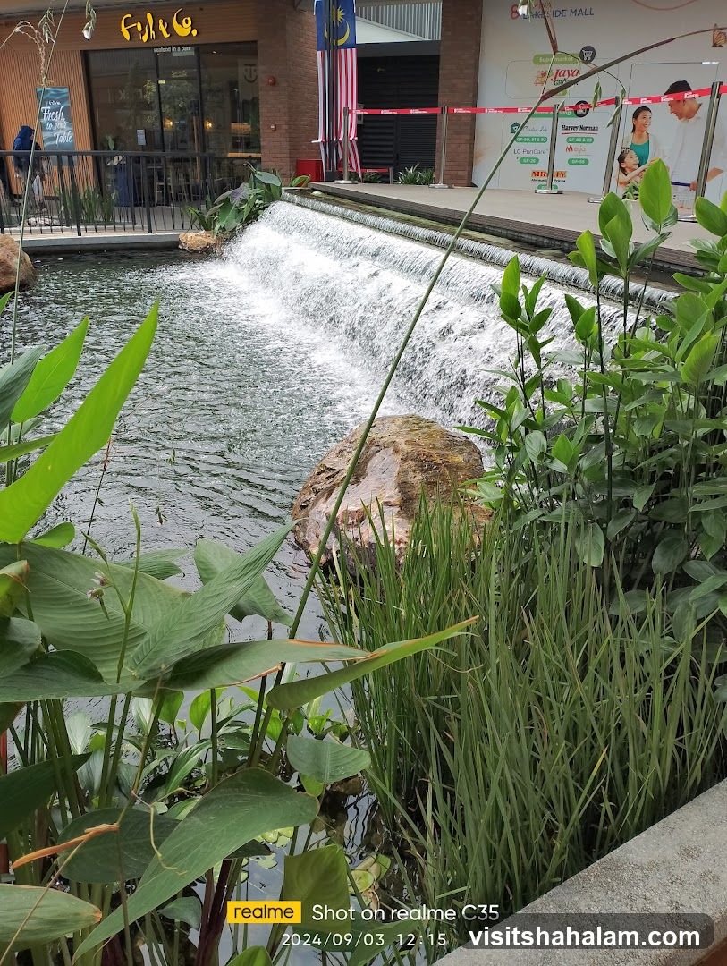 Outdoor waterfall and greenery