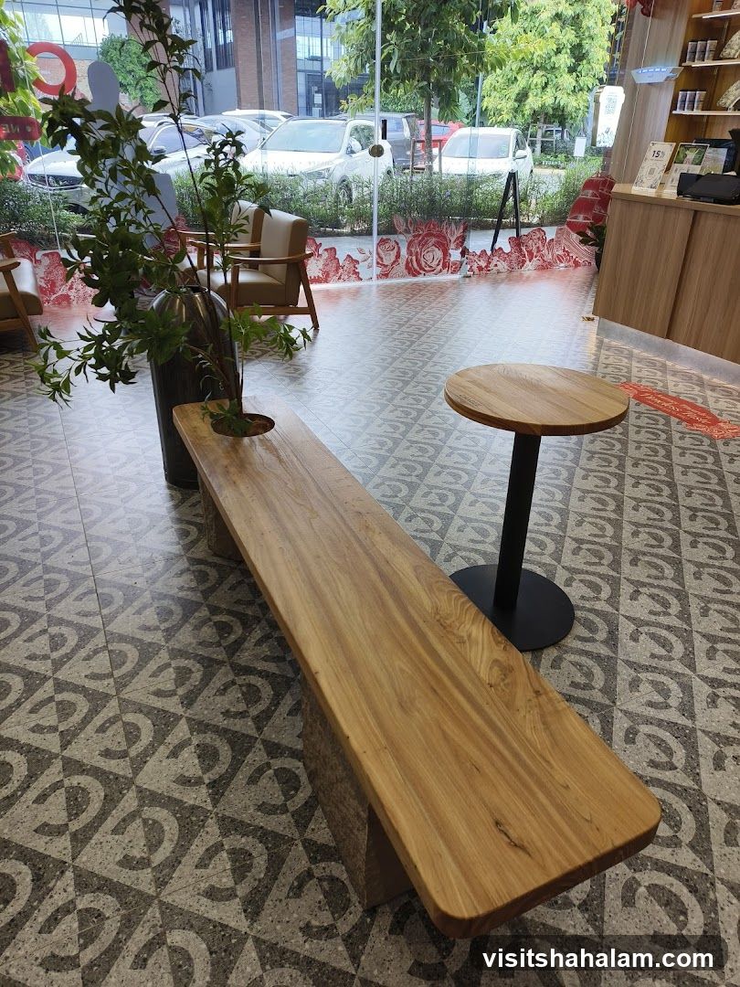Interior of a cafe with wooden furniture and plants