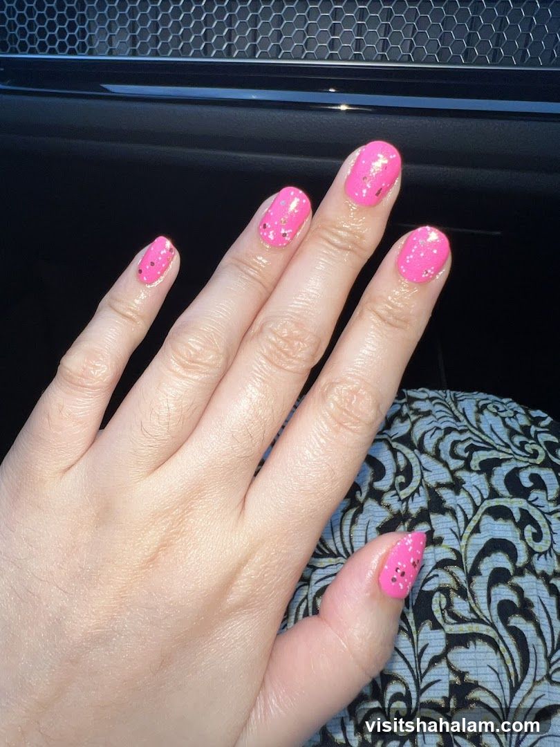 Pink Nails with Glitter Accents