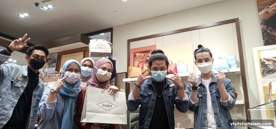 Group Posing in a Fossil Store