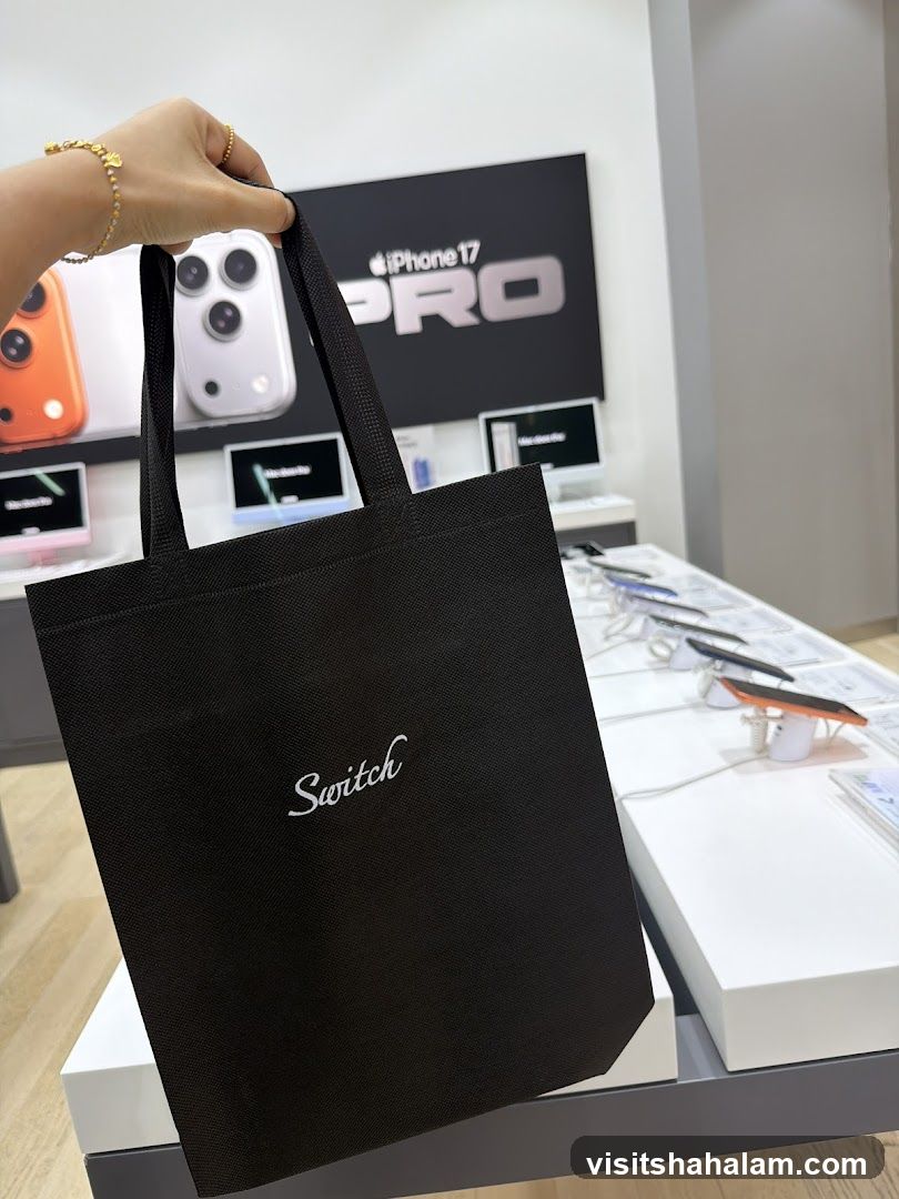 Black tote bag with "Switch" logo