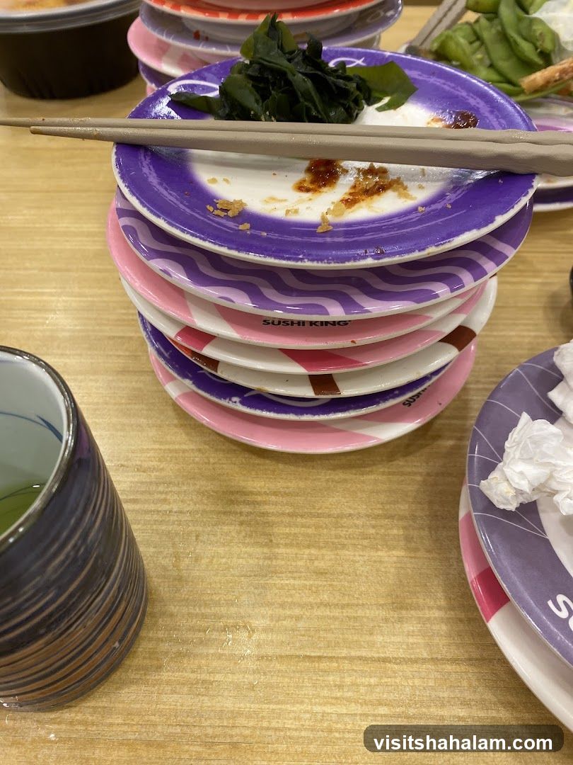 Used Sushi Plates and Tea Cup