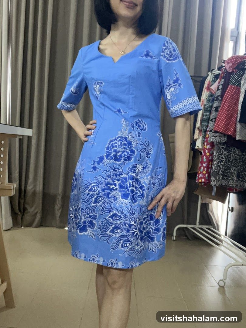 Woman in blue batik dress