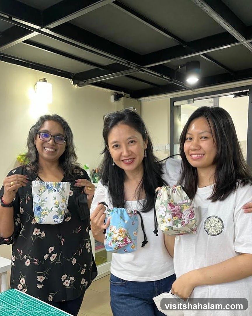 Women holding handmade drawstring bags