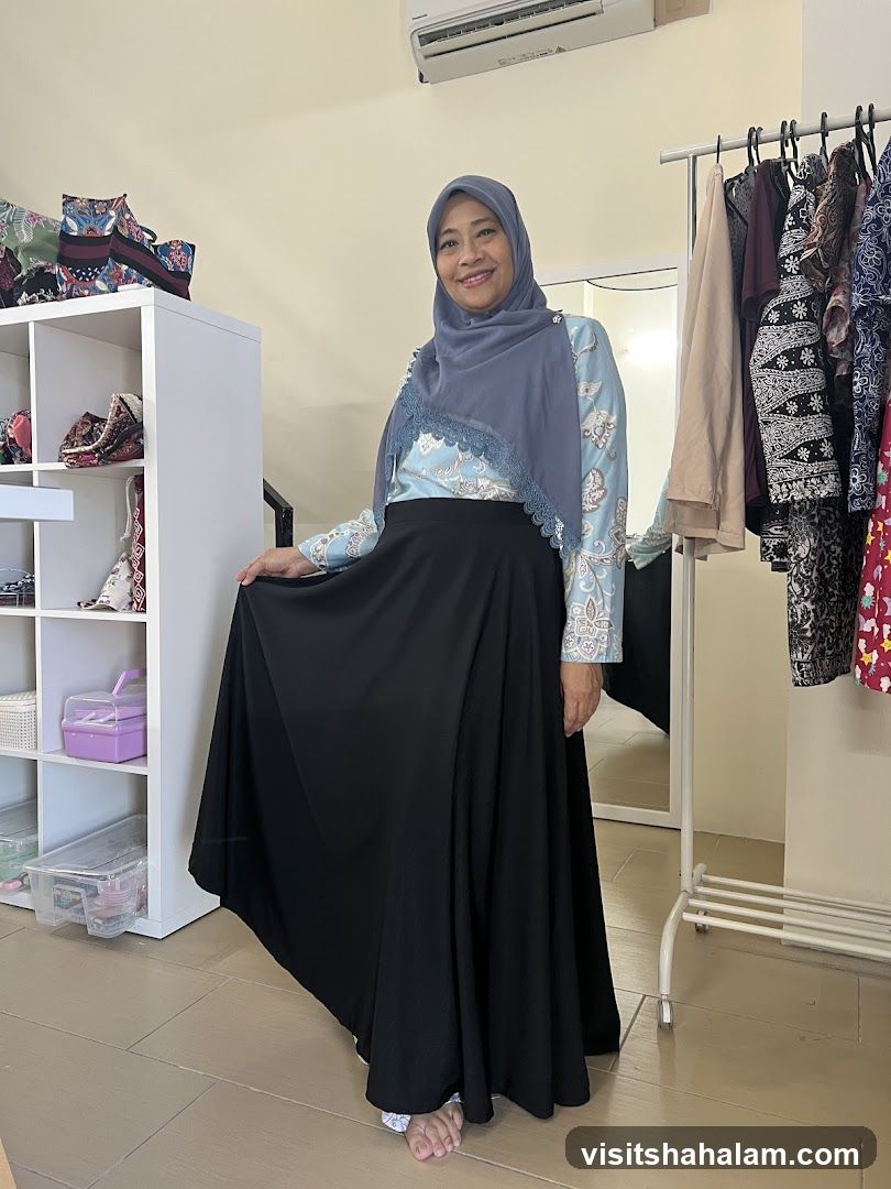Woman in a store with clothing racks