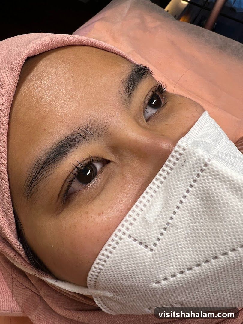 Close-up of a woman's face with a mask
