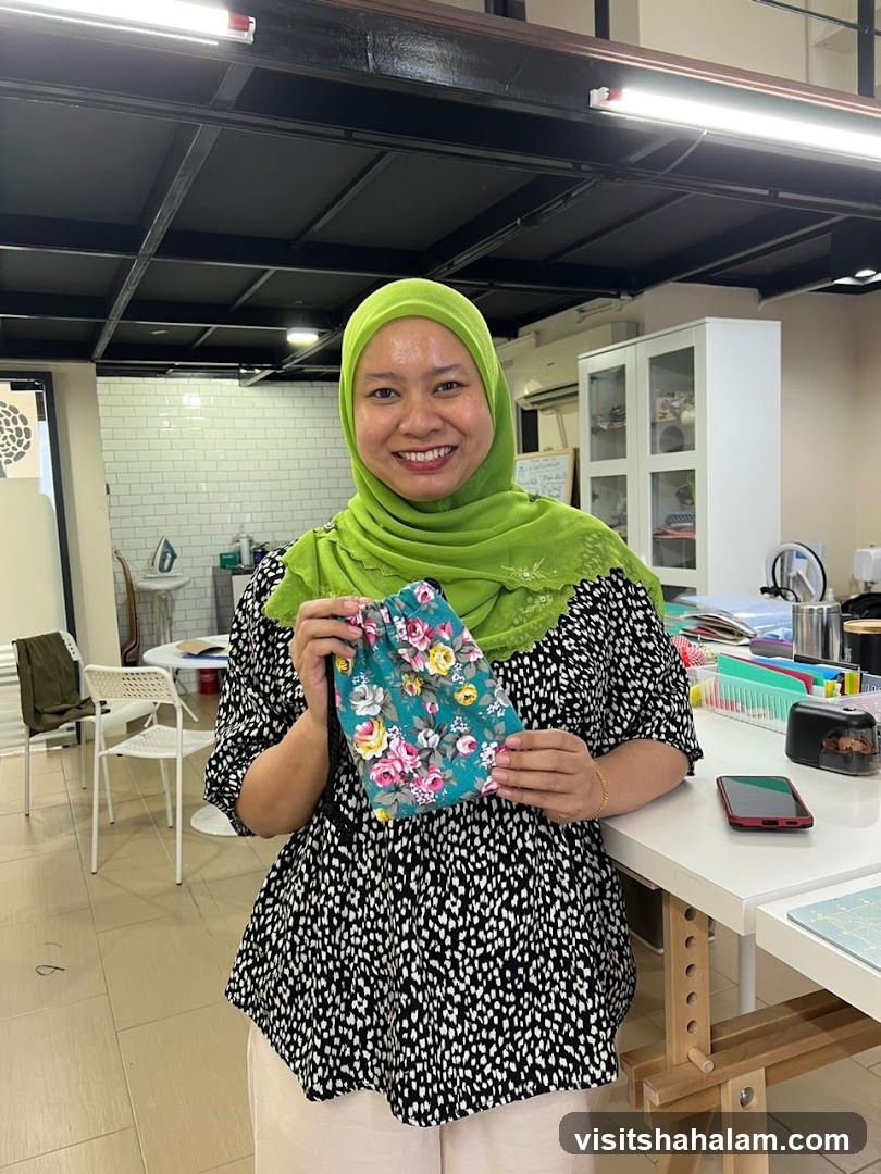 Woman holding a floral pouch