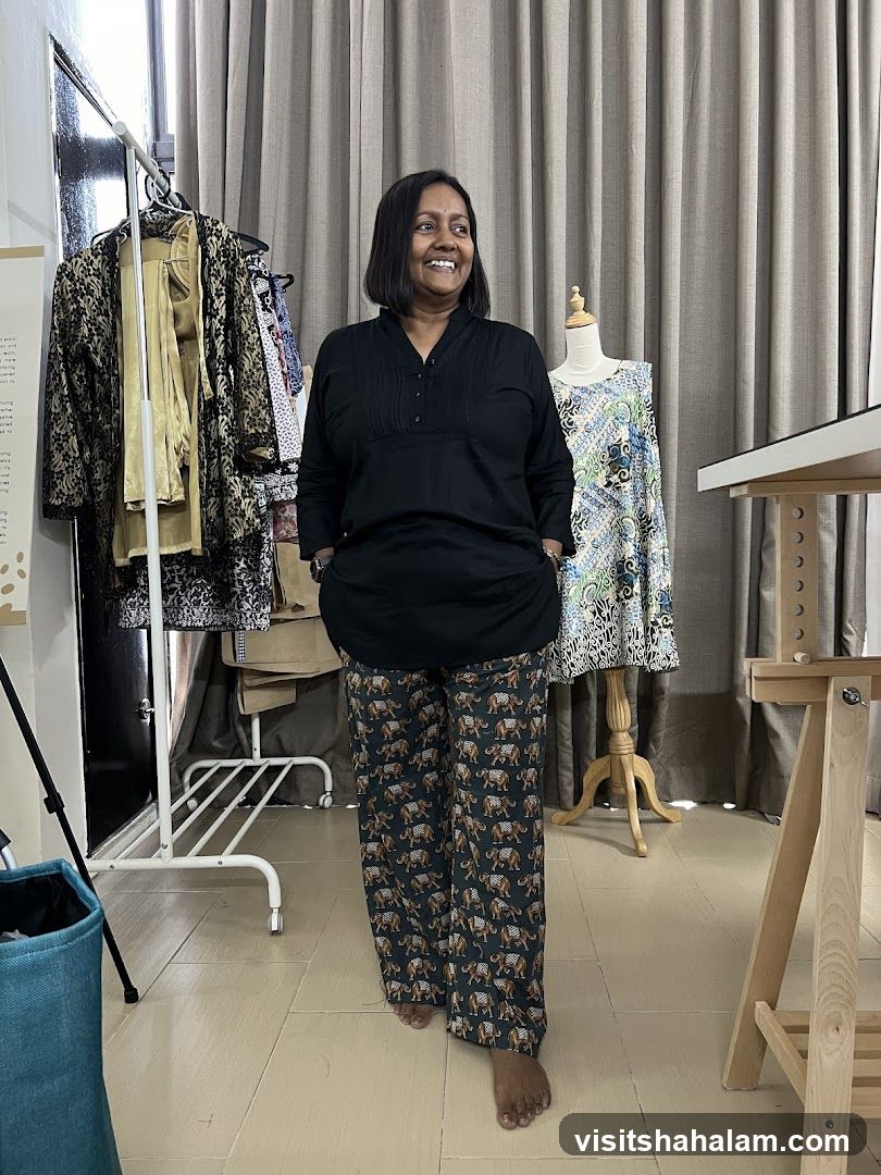 Woman in patterned pants in a studio
