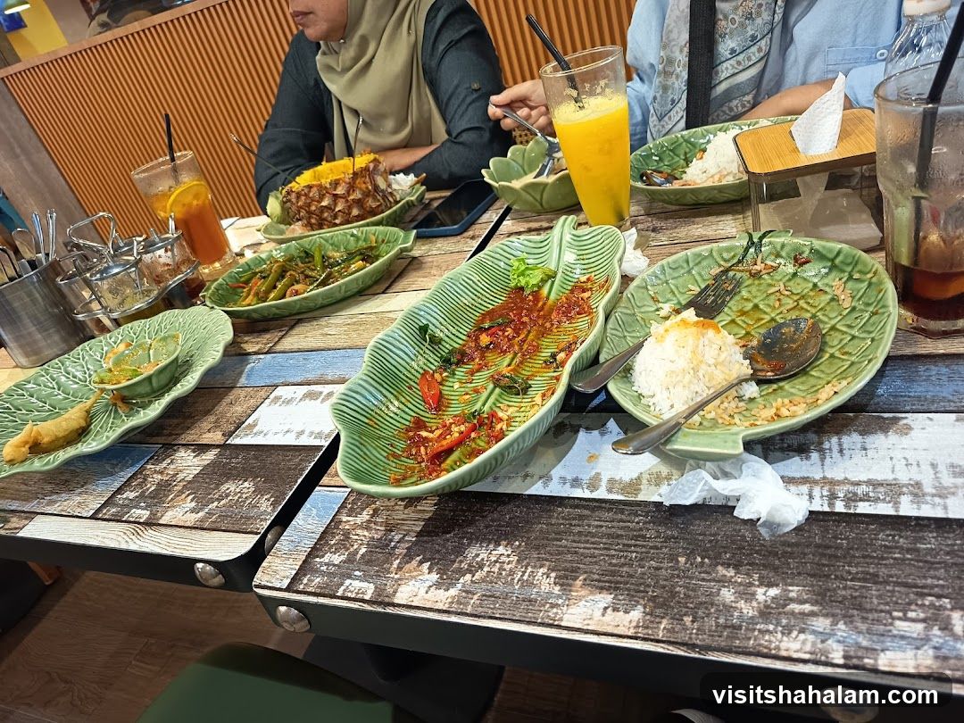 Table with partially eaten food and drinks