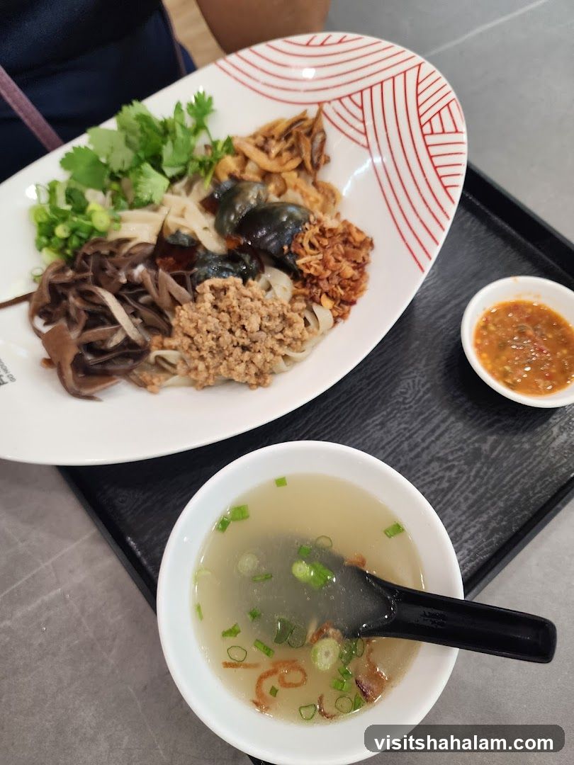 Noodles with Toppings and Soup