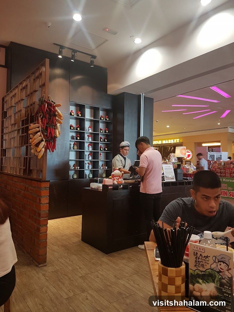 Restaurant Interior with Staff and Customers