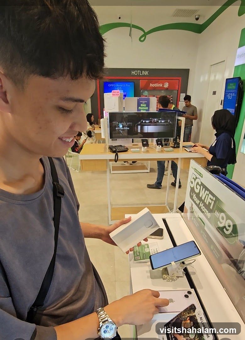 Customer examining a phone box