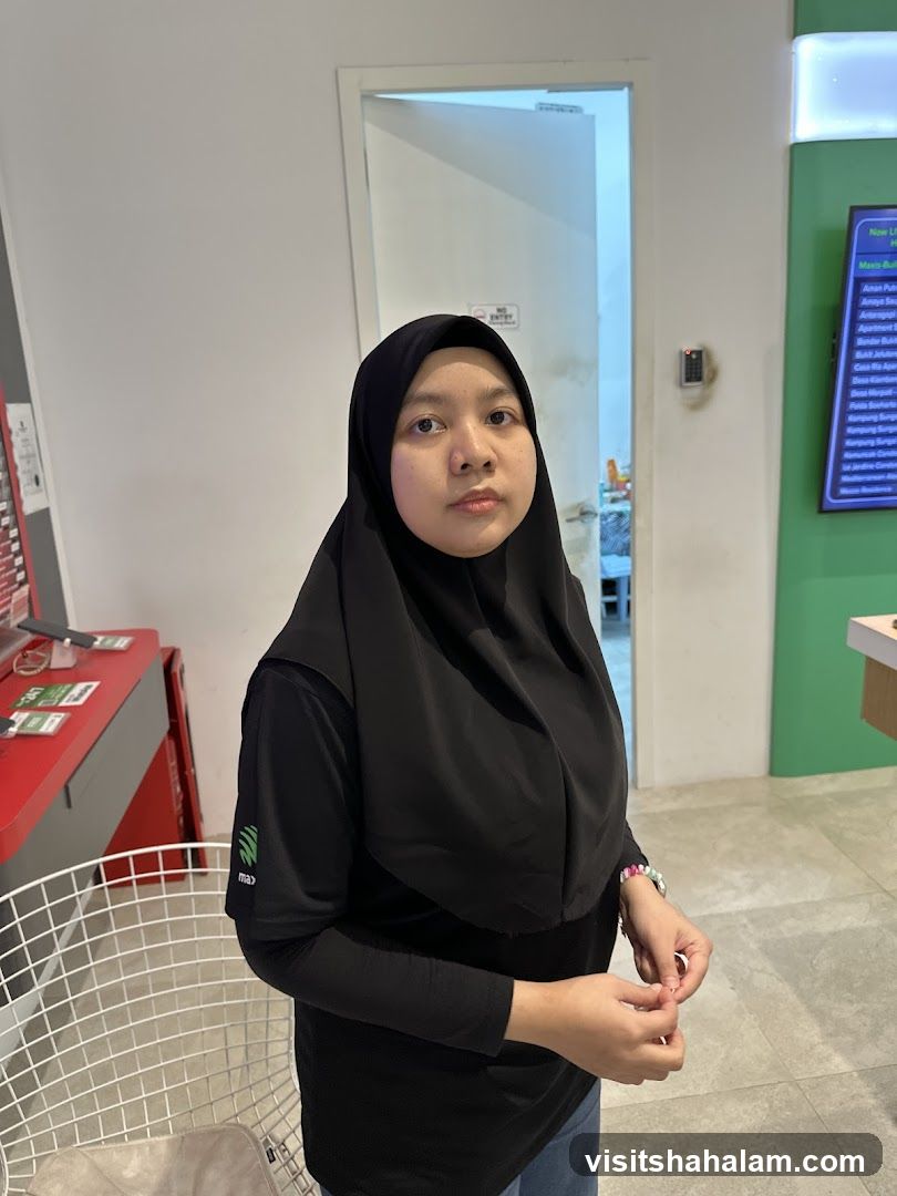 Woman in black hijab and shirt