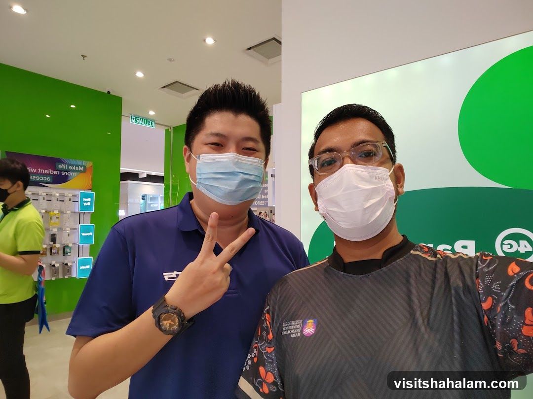 Two men in masks posing for a photo