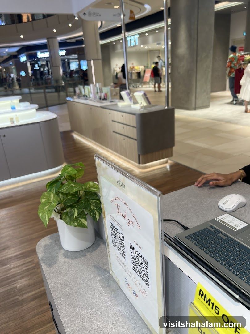 Store counter with QR codes and promotional sign