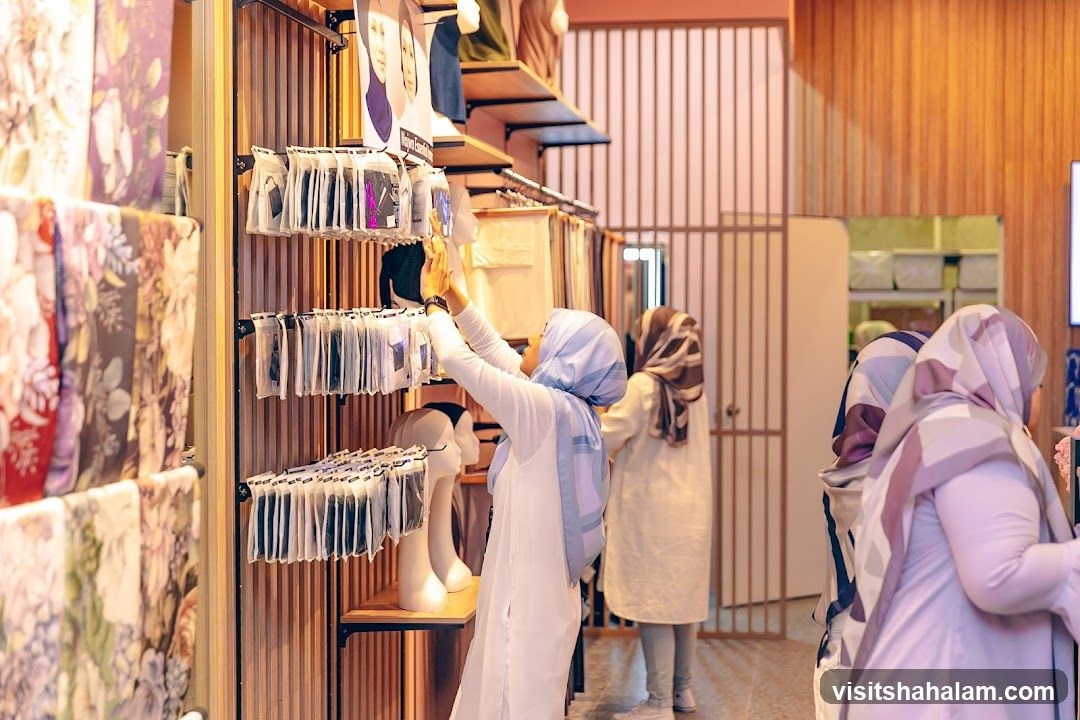 Customers browsing scarves in a store