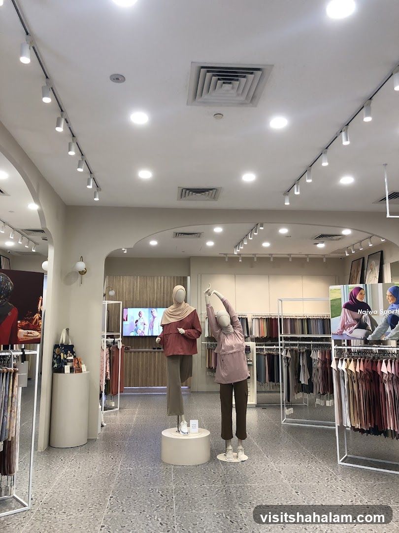 Clothing store interior with mannequins and apparel displays