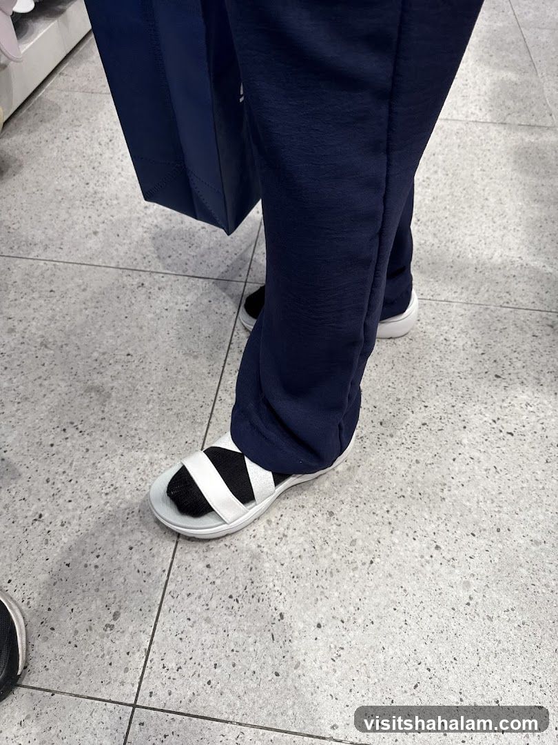 Person wearing sandals and socks