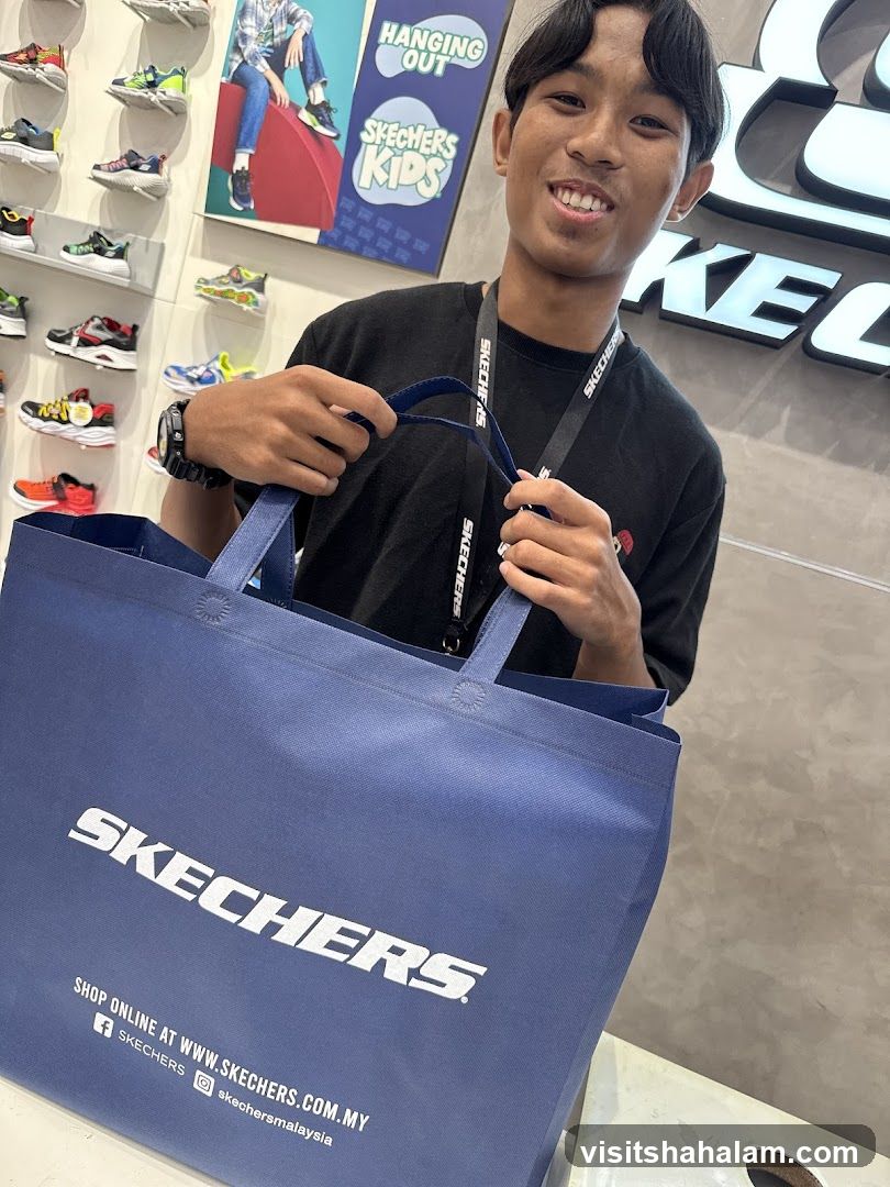Man Holding a Skechers Bag