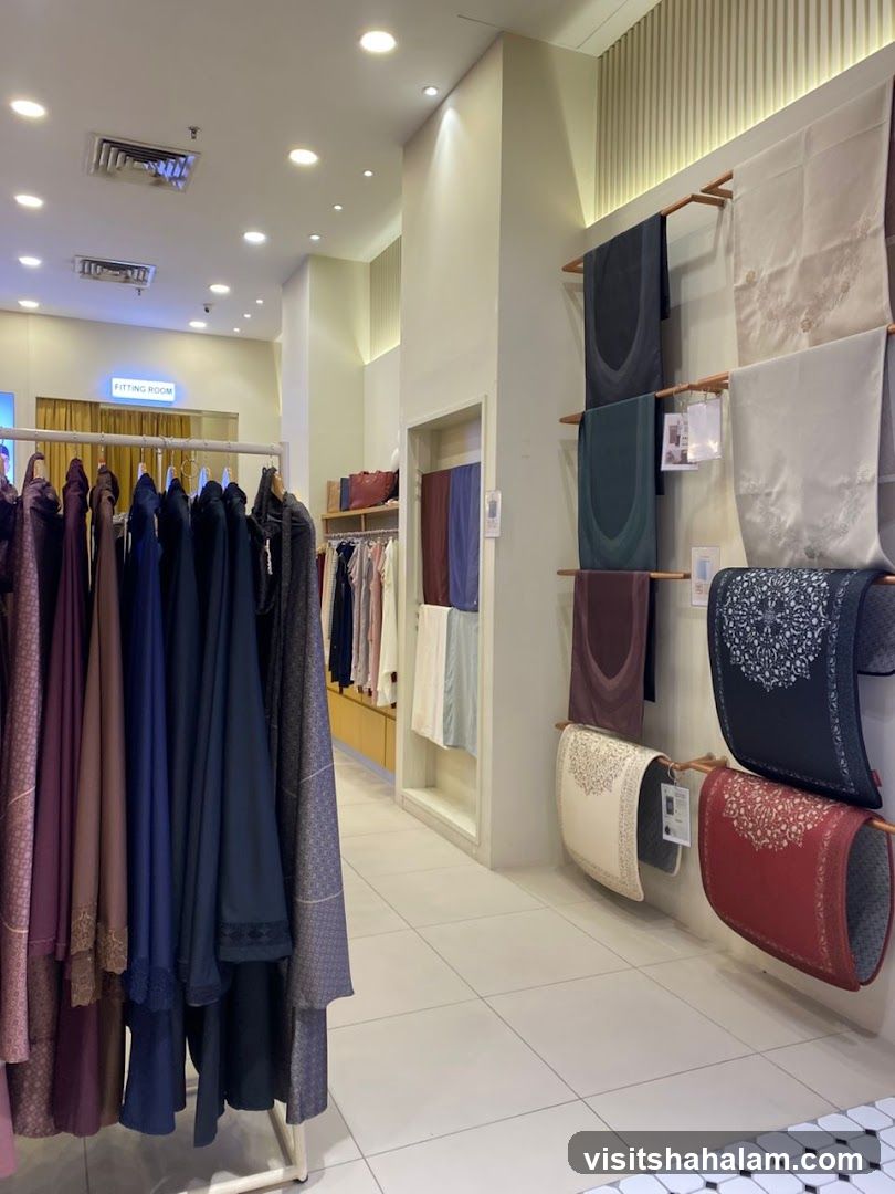 Clothing store interior with prayer mats and garments