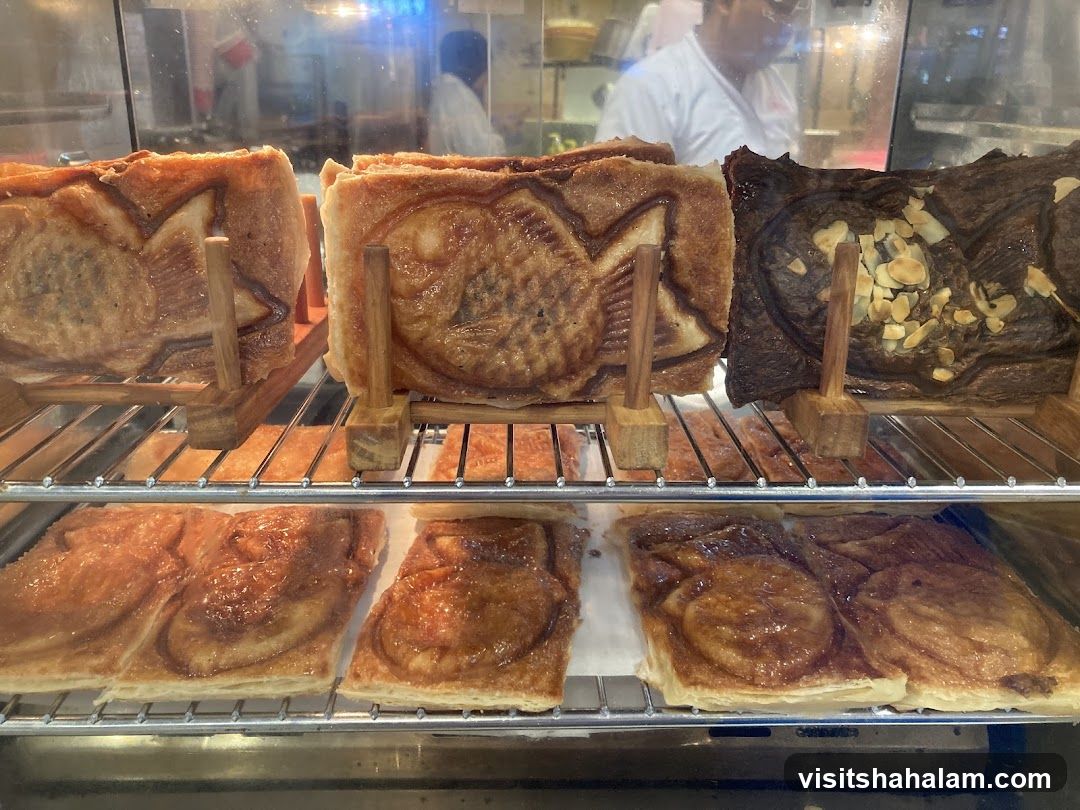 Fish-shaped pastries in a display case