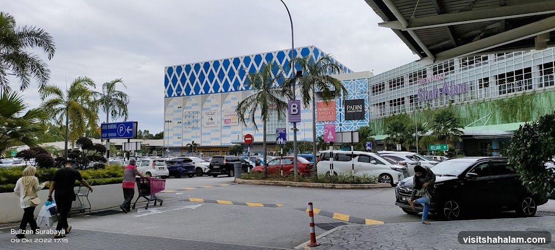 Shopping Mall Exterior with Parking Lot