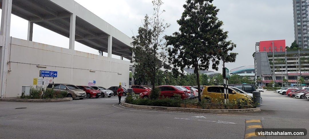 Parking Lot with Buildings and Cars