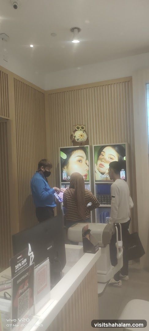 Cosmetics display with customers