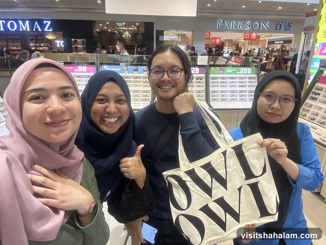 Group of friends posing for a selfie in a store