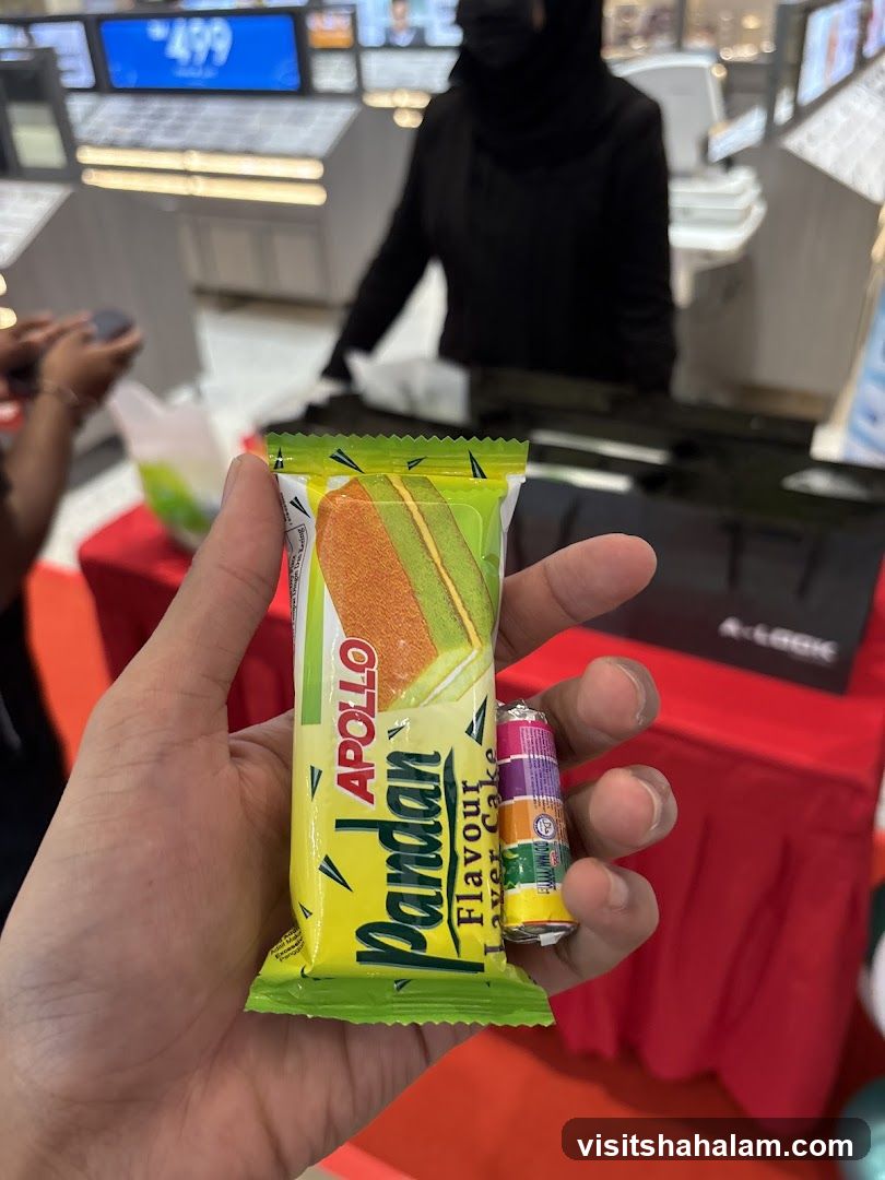 Hand Holding Apollo Pandan Flavor Layer Cake