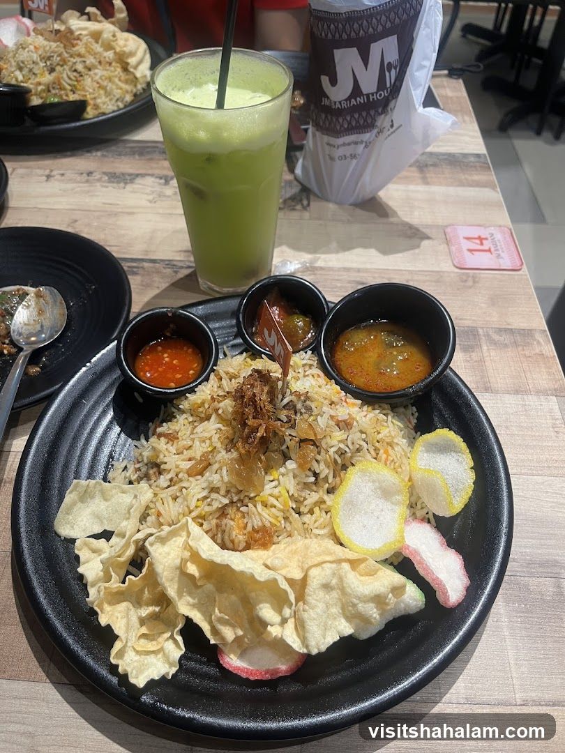 Biryani with Condiments and Drink
