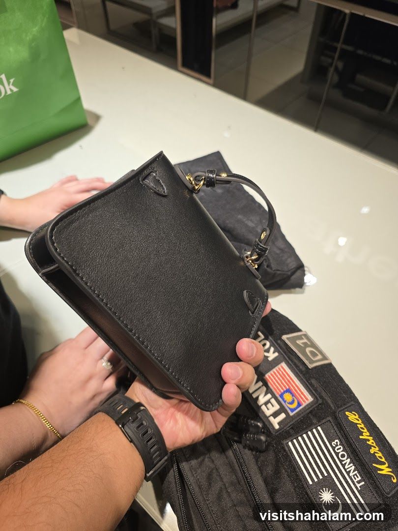 Black Handbag and Patched Jacket