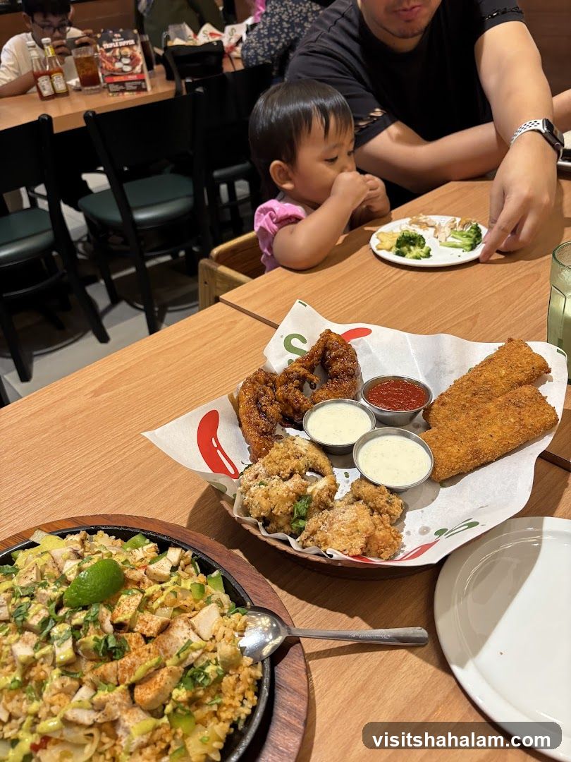 Family enjoying a meal at a restaurant