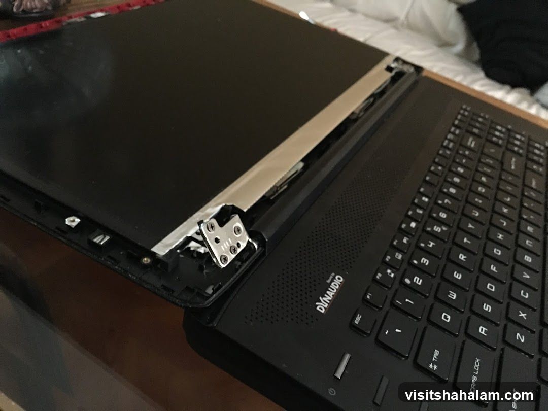 Disassembled Laptop Screen and Keyboard