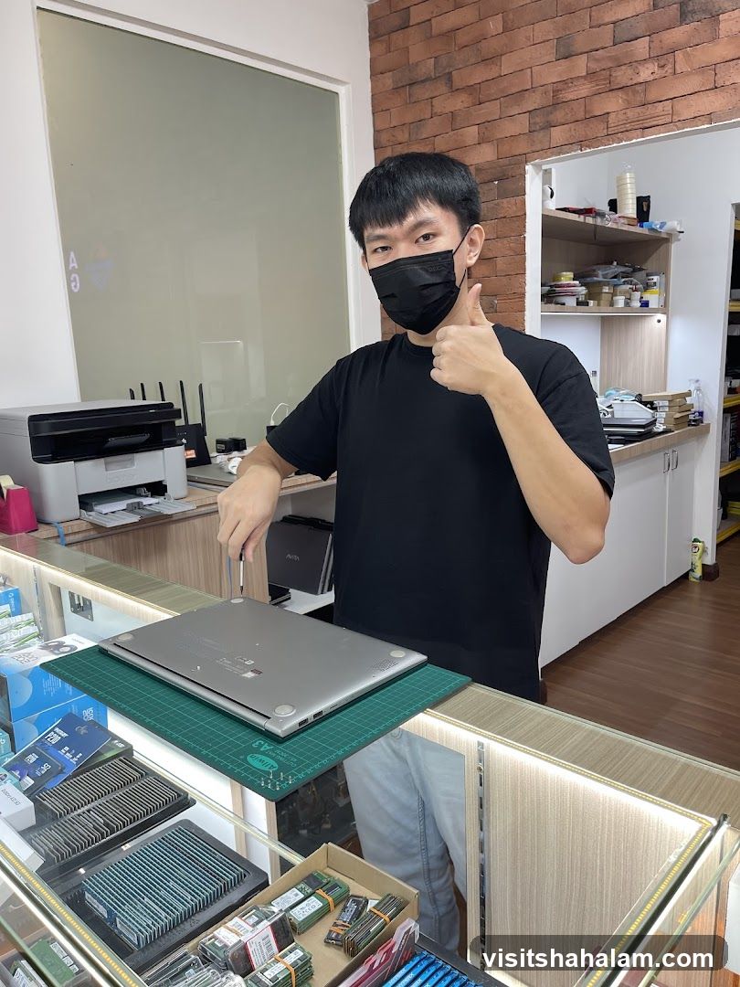 Technician working on a laptop